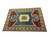 Rust red border frames the blue field on this hand-knotted Kazak design rug made in India
