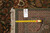Reverse side with inventory tag and tape measure confirming the 8' x 10' rug dimensions