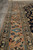 Salmon main border detail with woven birds, blue palmettes and narrow ivory guard stripes