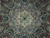 Close-up of the ivory and slate blue star medallion core with navy rosette center