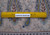 Ruler across the wool pile showing knots per square inch on this hand-knotted Kashan rug
