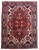 Full view of 7'10" x 10'6" Persian Tabriz rug with red medallion field and ivory spandrels