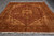 8'8" x 11'4" hand-knotted Heriz rug on grey tile, cream fringe and rust floral border