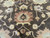 Macro of the all over floral field with rose palmette, gold rosettes and sage accents