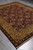 8 by 10 traditional Oriental rug on the diagonal against polished grey floor tile