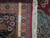 9x12 Persian Tabriz rug shown with ruler across pile to gauge knots per square inch