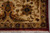 Corner detail with ivory guard stripe, navy flower head and clean burgundy outer edge