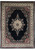9 x 12 black Kerman design rug shown flat with ivory medallion and floral ivory border
