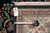9x12 hand-knotted rug back with tape measure and genuine hand woven Oriental rug tag
