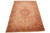 Beige and coral floral field angled view showing terracotta border and soft camel outer frame