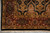 6x9 Oriental rug corner with rosette border, olive guard bands and ivory cotton fringe