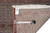 Back of the Persian Tabriz runner with dealer tag and tape measure confirming the 39 inch width