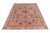 5'9" x 8'2" hand-knotted Kazak rug shown at an angle with full garden panel field