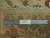 Ruler on the back of the 8'2" x 10'2" rug confirming authentic handmade knots per square inch