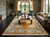 Living room styled with the 6' x 9' honey Aubusson rug under a brass coffee table