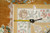 Reverse side with inventory tag reading 6'0" x 9'0" and tape measure across knots