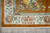 Corner detail with Greek key fret, urn motif and paired rose cartouches