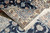 Folded corner revealing the cotton foundation and high knots per square inch of Nain weaving