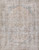 Full overhead view of vintage Persian rug in pastel gray with faded blue medallion and borders