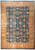 Teal and gold Ziegler rug with all-over ivory floral lattice and wide gold border