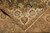 Corner folded back to reveal the even hand-knotted back and clean weave of this rug