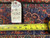 Back tag reading 4.5 x 6.7 with tape measure confirming the Bijar rug size