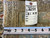 Back tag marked rug number 6639 beside a tape measure confirming hand woven Oriental rug