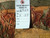 Reverse of the flat tapestry weave with dealer tag reading rug number 6325, size 6 x 8.5
