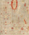 Corner close-up showing the ivory guard border, red serrated palmette and small reciprocal border figures