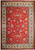 Red field Persian Tabriz rug with ivory floral border and all-over palmette design, overhead view