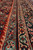 Detail of sea green minor border and ivory palmette guard bands on vintage Mahal