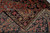 Back of the 3x5 Sarough rug folded over, showing knot density and faithful design