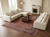 Coral red Sarouk square rug anchoring a cream sectional and walnut coffee table in a living room