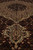 Perspective view across the medallion pendant showing fine wool and silk pile sheen