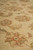 Low angle detail showing the short 5/16 inch wool pile and faded brick floral outlines