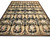 Full view of black Aubusson rug with ivory urns, pink rose bouquets and scrolling leafy vines