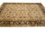 Wide perspective of large hand-knotted wool rug, soft olive field, gold vines, repeating rosettes