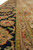 Macro detail of main border and camel guard band with multicolor floral drawing