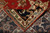 Folded corner revealing even hand-knotted back, tight knot rows and cotton foundation of this rug