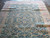 Blue and ivory all over design seen along the length of this low pile rug
