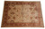 9' x 12' Agra rug from India displayed flat with all over palmette and vine pattern