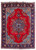 Red open field Persian Tabriz rug with navy floral medallion and sky blue corner spandrels