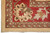 Border corner detail with ivory lotus palmette, gold zigzag guard stripe and beige selvage