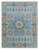 Overhead view of 10'1 x 14'1 turquoise Oushak Mamluk rug with green octagon medallion