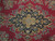 Detail of navy and gold central medallion with 8 petal rosette core and pink blossoms