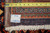9'7" x 12'11" measuring tape and workshop tag on reverse of hand-knotted wool Tabriz rug