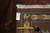 10'2 x 14 rug tag and tape measure on brown border confirm hand-knotted wool construction
