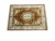 Gold Aubusson area rug displayed flat on white studio floor with silky fringed ends