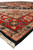 9x12 Serapi rug side angle showing navy selvedge, rust border and ivory fringe ends
