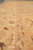 Border detail with apricot ground, brown arabesque scroll and tiny paired leaf guard stripe